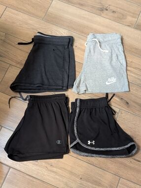 Bundle Of Four Pairs Of Small Nike Under Armor And Champion Brand Soft Shorts